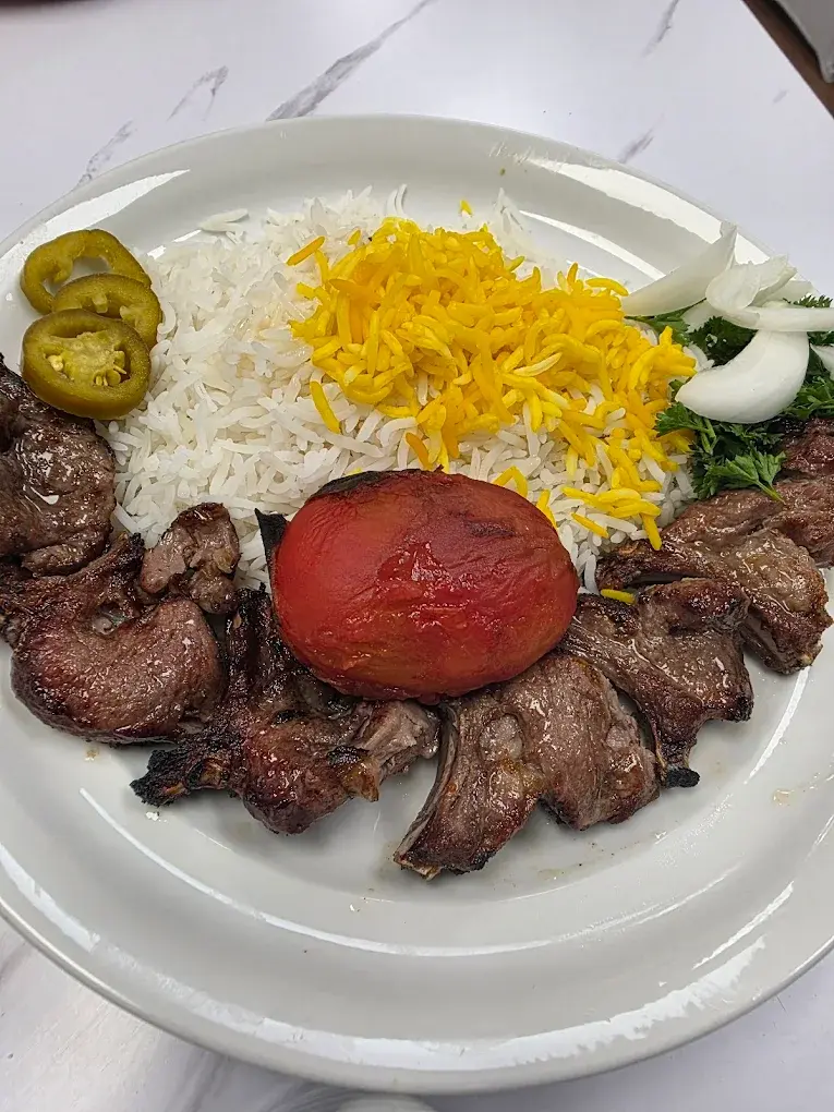 Joojeh Kebab - Tender chicken kebab at Nik Persian Restaurant Regina